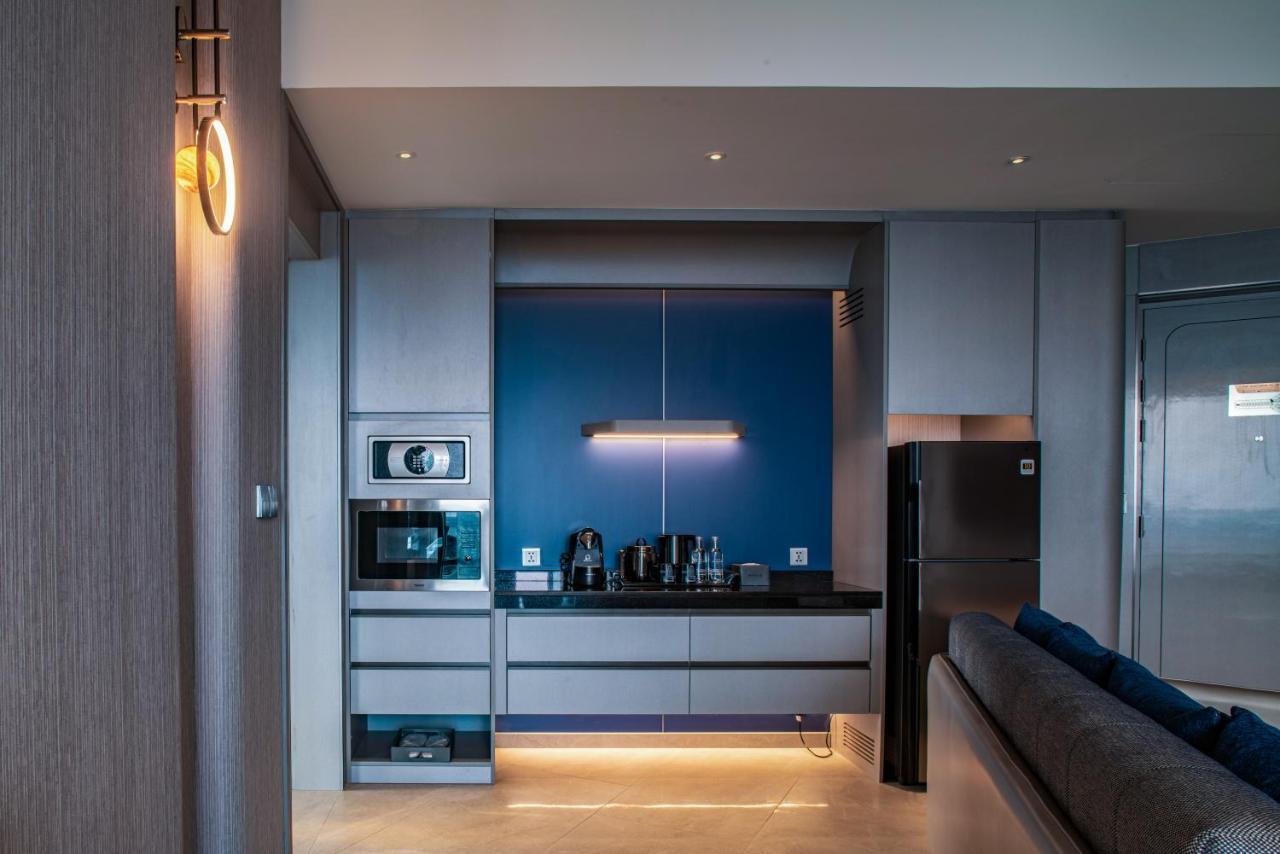 Grande Centre Point Space Pattaya Eksteriør bilde A kitchen in a private home